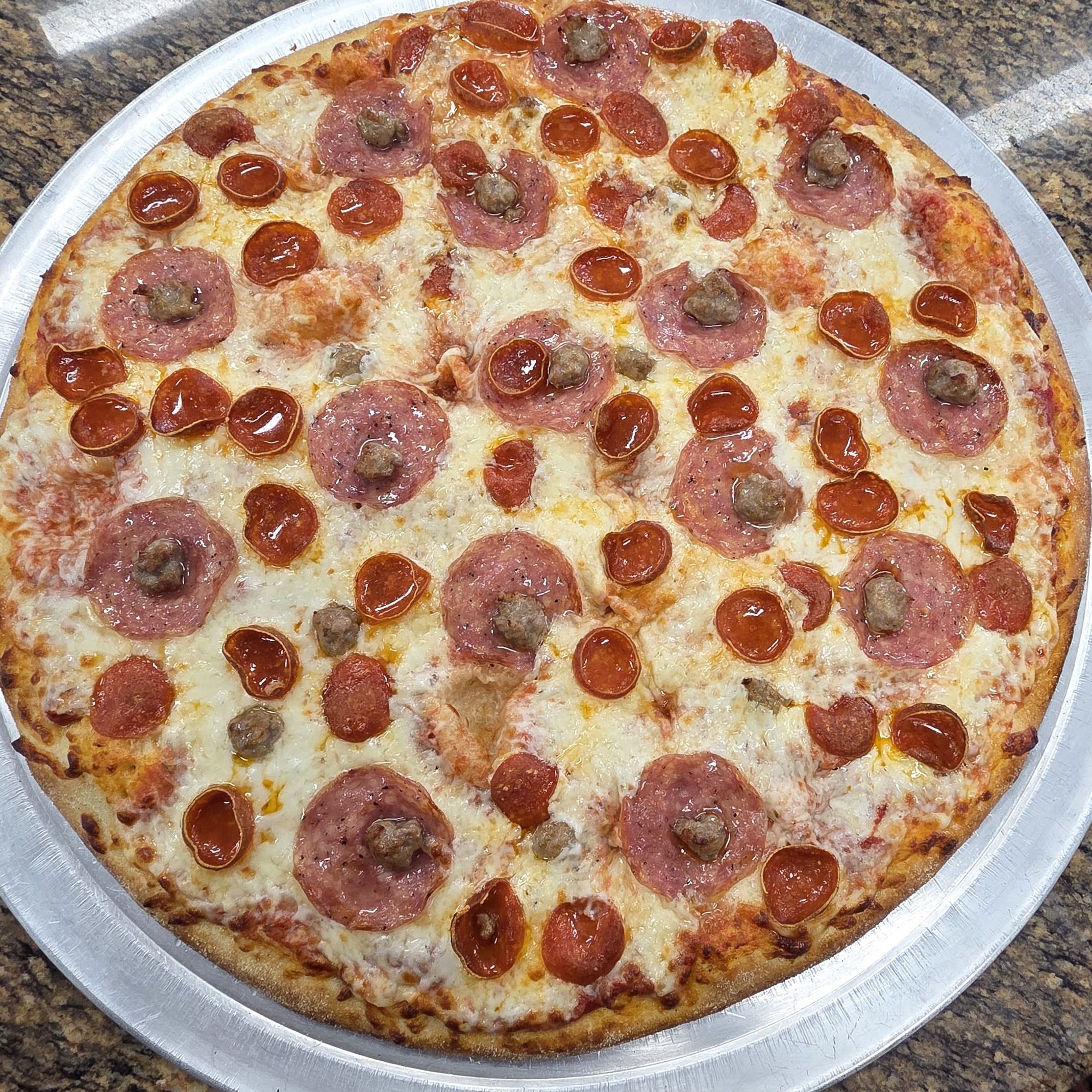 Extra Large Meat Marvel Pizza.