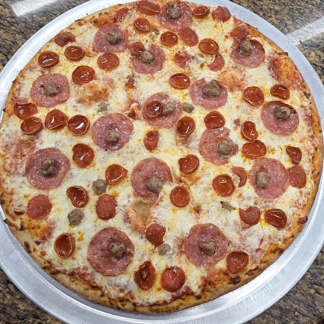 Extra Large Meat Marvel Pizza.