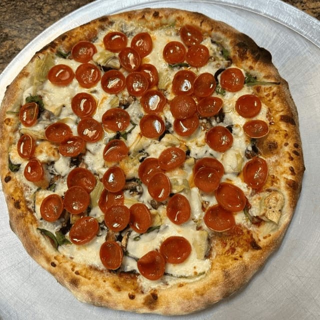 Extra Large Espee Combo Pizza.